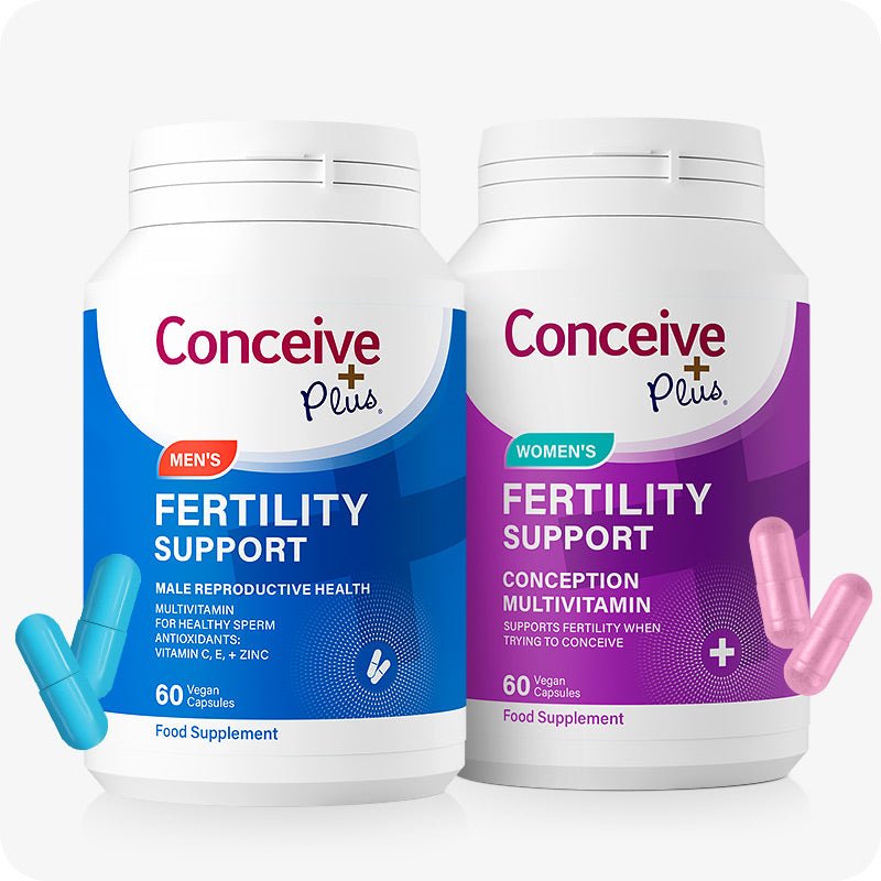 Conceive Plus Couples Bundle Fertility Support | His/Her Deal featuring two supplement bottles—Men's Fertility Support in blue and Women's Fertility Support in purple—each with 60 vegan capsules, shown with matching blue and pink capsules on a clean white background.