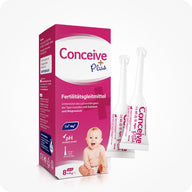Conceive Plus Fertility Lubricant Applicators 8x4g German edition featuring a pink and white box with a baby image and three pre-filled applicators shown beside it. Highlights include calcium, magnesium, pH balance, and sperm viability support on a white background.