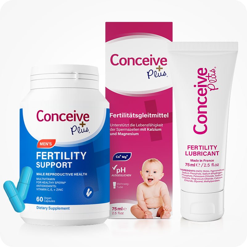 Conceive Plus Men's Fertility Support + Lubricant (DE) combination pack featuring a 60-capsule men's fertility support supplement bottle, a pink German-language lubricant box with a smiling baby image, and a 75ml fertility lubricant white tube, all aligned against a white background.