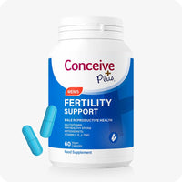 For Conceive Plus Men's Fertility Support + Lubricant (DE), image of Men's Fertility Support supplement bottle shown in front view with bold blue and white label, highlighting 60 vegan capsules for male reproductive health, multivitamin support, and antioxidants; two loose blue capsules displayed alongside container.