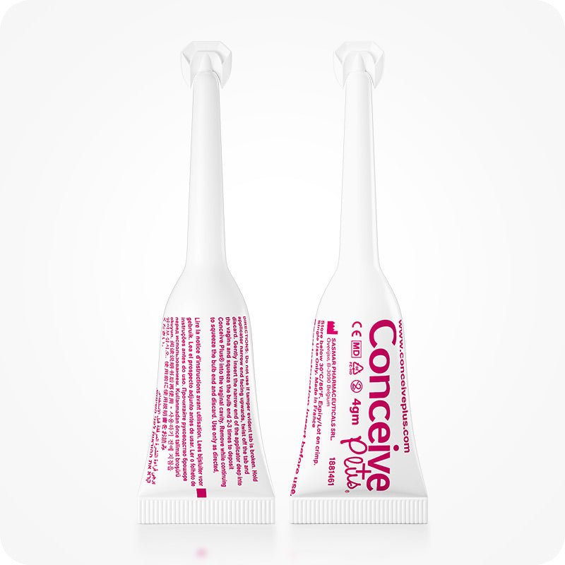 For Conceive Plus Fertility Lubricant Combo 75ml + 8 applicators (DE), image showing front and back views of 4g pre-filled fertility lubricant vaginal applicators, featuring detailed product labeling in pink, CE and MD symbols, and German instructions printed on each white plastic tube.
